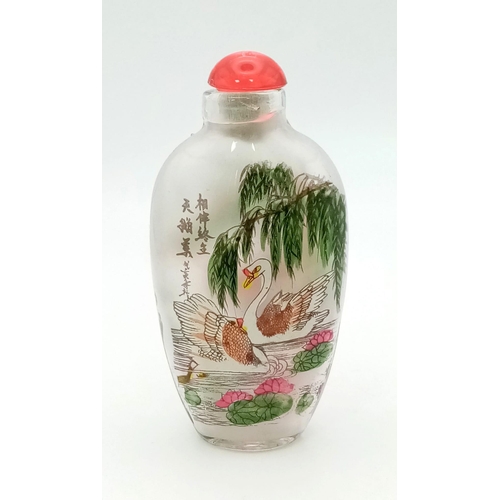 751 - An Asian Bird and Floral Decorative Glass Perfume Bottle. 8cm