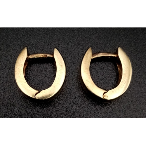 113 - A Small Pair of 9K Yellow Gold Small Horse-Hoop Earrings. 
2.78g