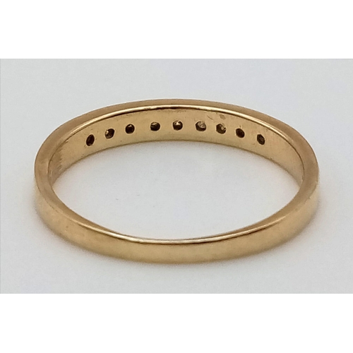 579 - A 14K Yellow Gold Diamond Half-Eternity Ring. Size L. 1.52g total weight.