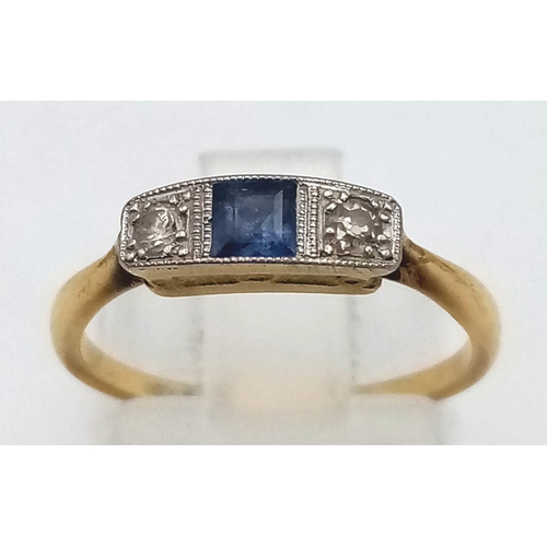 580 - A Vintage 9K Yellow Gold Diamond and Sapphire Ring. Central sapphire with a diamond either side. Siz... 