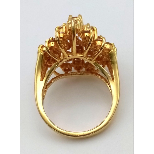 341 - A 14K Yellow Gold Floral Burst Diamond Ring. 34 VVS/VS brilliant round-cut diamonds equate to a mass... 