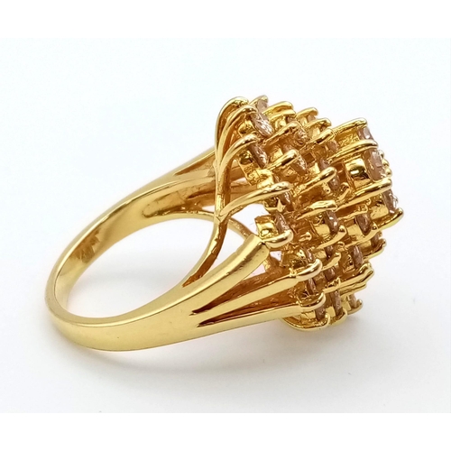 341 - A 14K Yellow Gold Floral Burst Diamond Ring. 34 VVS/VS brilliant round-cut diamonds equate to a mass... 