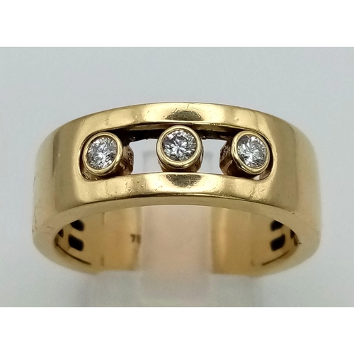 150 - An 18K Yellow Gold Floating Three Diamond Band Ring. Size T. 9.4g total weight. Ref: 52