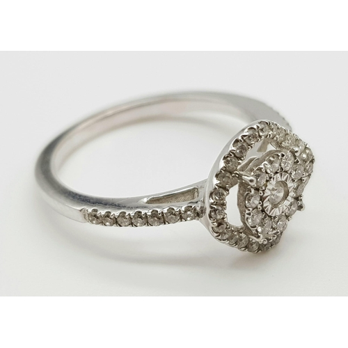 800 - A 14K White Gold Diamond Cluster Ring. Size M. 2.74g total weight. Ref: 29