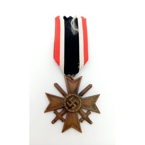 769 - 3rd Reich War Merit Cross with swords 2 Class Medal.