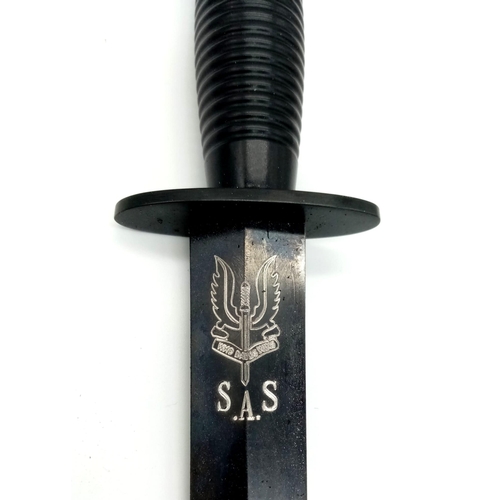 230 - Current Day British Commando Dagger with the Special Air Service Logo etched onto the blade.