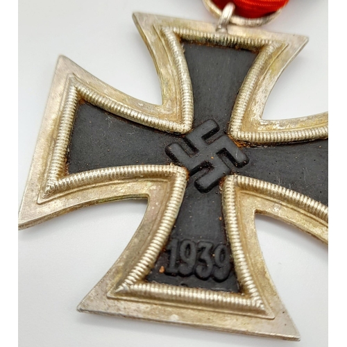 69 - WW2 German Kriegsmarine Iron Cross 2nd Class and certificate awarded to an Nco radio operator.