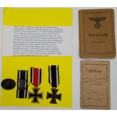 97 - WW1 & WW2 German Soldbuchs and awards to the same man. He was awarded the Iron Cross
2nd class in WW... 