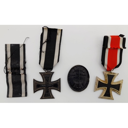 97 - WW1 & WW2 German Soldbuchs and awards to the same man. He was awarded the Iron Cross
2nd class in WW... 