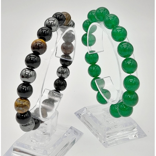 1123 - A Green Jade and a Tigers Eye, Obsidian and Hematite Expandable Bracelet. Jade -12mm. Others - 8mm.