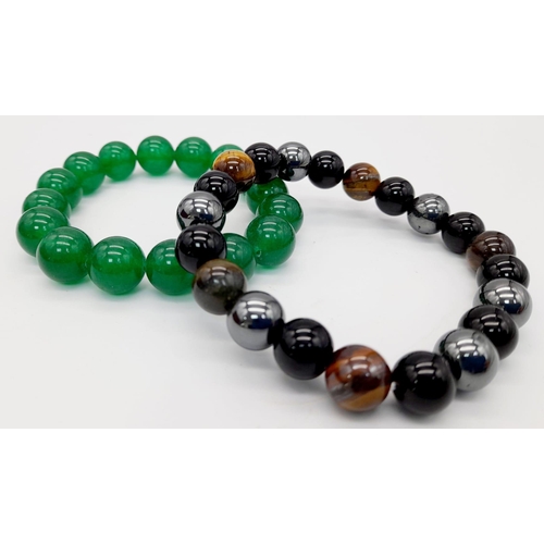 1123 - A Green Jade and a Tigers Eye, Obsidian and Hematite Expandable Bracelet. Jade -12mm. Others - 8mm.