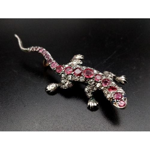 250 - A Rare Victorian Ruby and Diamond High-Karat Salamander Brooch. Vibrant rubies and diamonds set in s... 