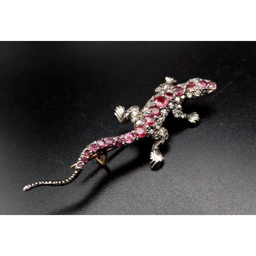 250 - A Rare Victorian Ruby and Diamond High-Karat Salamander Brooch. Vibrant rubies and diamonds set in s... 