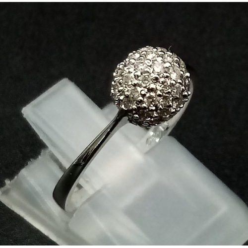 271 - An 18K Diamond Ring. 0.5ct of full-cut diamonds give a wonderful glitter-ball effect. Size N. 2g tot... 