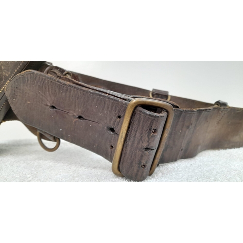 288 - WW1 British Officers Sam Browne Belt and Webley Revolver Holster. This was actually found in a
cella... 