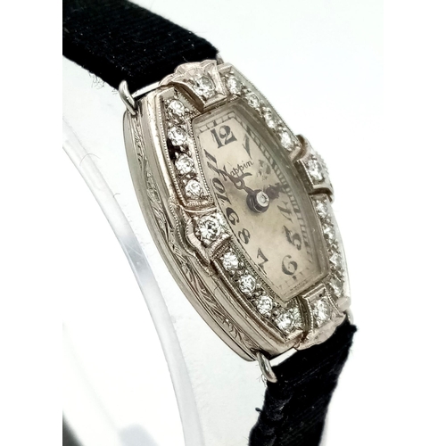 32 - An Antique Mappin and Webb (By Royal Appointment) Platinum and Diamond Bezel Ladies Watch. Mechanica... 