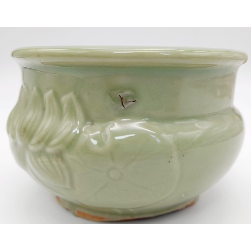 590 - A RARE ANTIQUE CHINESE BUDDHIST CELADON CENSOR WITH EXCEPTIONAL LOTUS FLOWER AND LEAF DESIGN . CIRCA... 