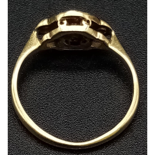 756 - An 18K Edwardian Yellow Gold, Platinum and Diamond Ring. Nine diamonds. Size G. 2.28g total weight.