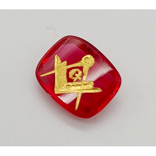 770 - A 3.5ct Faceted Ruby with a Gold Tooled Masonic Emblem.