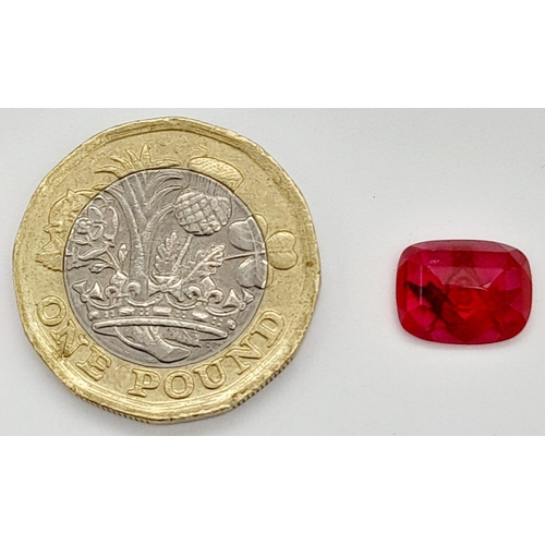 770 - A 3.5ct Faceted Ruby with a Gold Tooled Masonic Emblem.