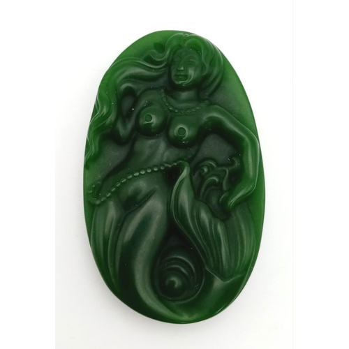 771 - A Chinese Green Jade Mermaid Pendant. 5.5cm