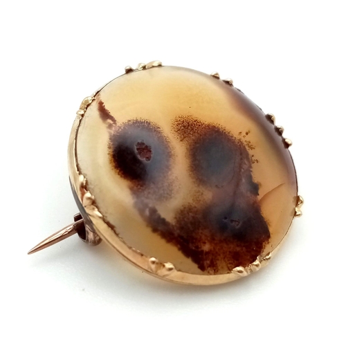 777 - A Georgian Agate Brooch set in High-Karat Gold. 20mm