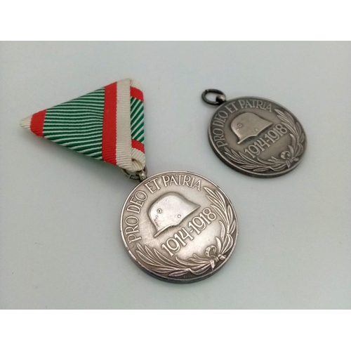 123 - A Pair of WW1 Austro Hungary Bravery Medals ‘Pro Deo Et Patria’ 1914- 1918. One with ribbon, one wit... 