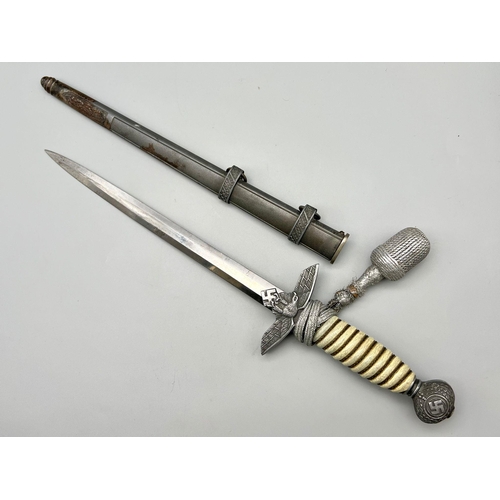 151 - 3rd Reich 2nd Pattern Luftwaffe Dagger made by WKC (Weyersberg) with an unmarked blade.
Complete wit... 