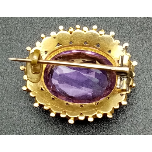 292 - A Gorgeous Antique Victorian Amethyst and Pearl Brooch. A 10ct crystal-clear amethyst with a pearl s... 