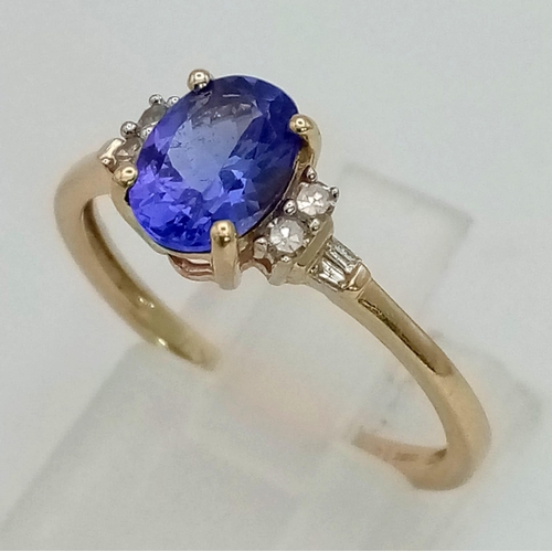 431 - 9k yellow gold tanzanite and diamond ring 1.8g, size O, (dia:0.06ct/ tanzanite:0.48ct)