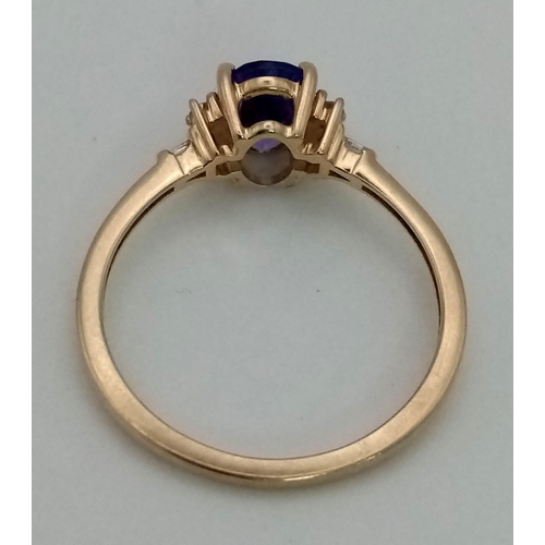 431 - 9k yellow gold tanzanite and diamond ring 1.8g, size O, (dia:0.06ct/ tanzanite:0.48ct)