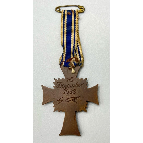 432 - A German Cross of Honour Mother Medal dated 1938