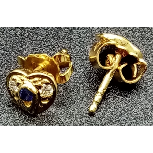 763 - A Pair of 18K Gold Sapphire and Diamond Heart-Shaped Stud Earrings.