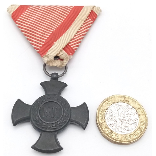 804 - A WW1 Austrian 1916 Cross Medal with Ribbon