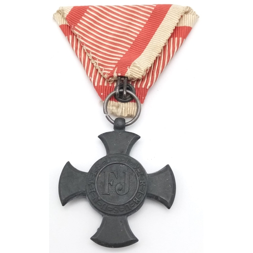 804 - A WW1 Austrian 1916 Cross Medal with Ribbon