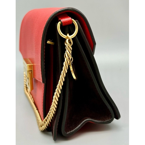 347 - A Givenchy GV3 Red Leather and Suede Shoulder Bag. Gilded hardware and shoulder chain. Multi-compart... 