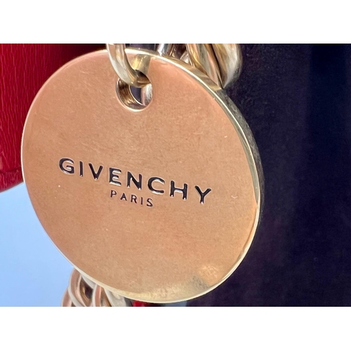 347 - A Givenchy GV3 Red Leather and Suede Shoulder Bag. Gilded hardware and shoulder chain. Multi-compart... 