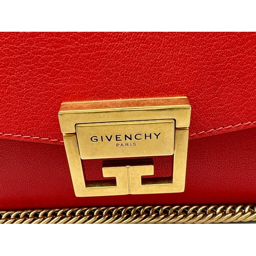 347 - A Givenchy GV3 Red Leather and Suede Shoulder Bag. Gilded hardware and shoulder chain. Multi-compart... 