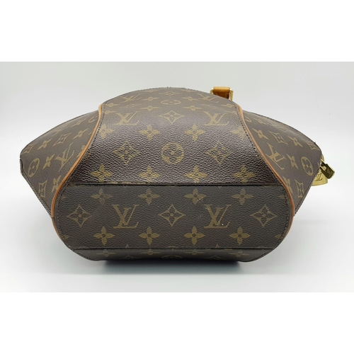 509 - A Louis Vuitton Ellipse Handbag. Monogram canvas with brown leather handles and trim. In good condit... 