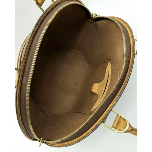 509 - A Louis Vuitton Ellipse Handbag. Monogram canvas with brown leather handles and trim. In good condit... 