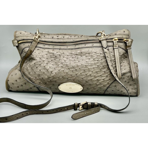 719 - A Mulberry Taylor Satchel Bag. Grey calfskin leather with oval silver tone Mulberry badge. Zipped in... 