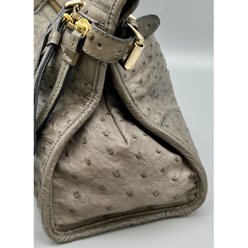 719 - A Mulberry Taylor Satchel Bag. Grey calfskin leather with oval silver tone Mulberry badge. Zipped in... 