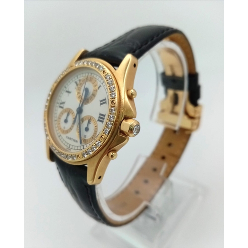 92 - A Cartier 18K Gold Quartz Chronograph Ladies Watch. Black leather strap with Cartier 18k gold buckle... 