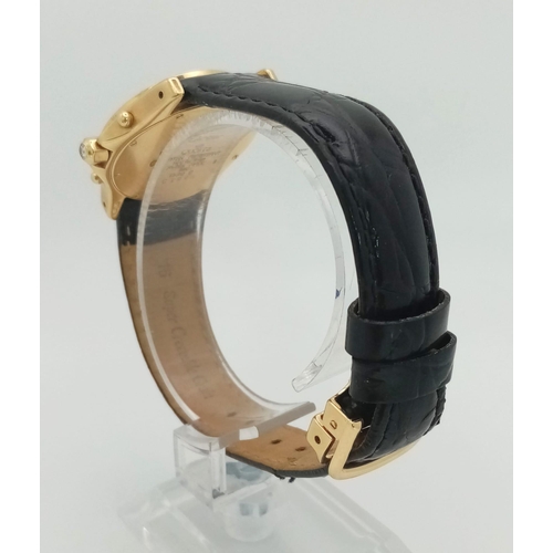 92 - A Cartier 18K Gold Quartz Chronograph Ladies Watch. Black leather strap with Cartier 18k gold buckle... 