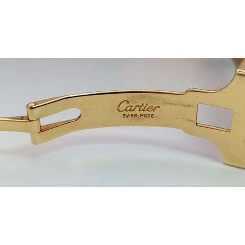 92 - A Cartier 18K Gold Quartz Chronograph Ladies Watch. Black leather strap with Cartier 18k gold buckle... 