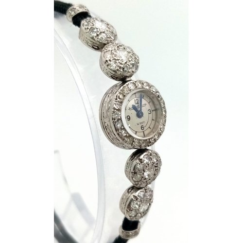 429 - A Vintage Jaeger Le Coultre Ladies Diamond Dress Watch. Cloth and metal bracelet. Case - 14mm. Diamo... 