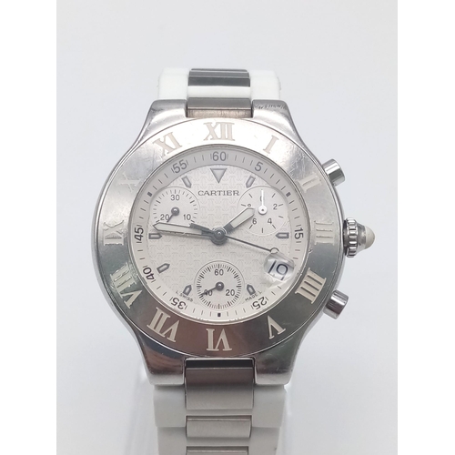 436 - A Cartier Chronoscaph Quartz Watch. White rubber and steel bracelet. Case - 38mm. Cream dial with th... 