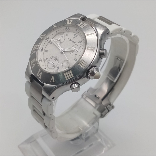 436 - A Cartier Chronoscaph Quartz Watch. White rubber and steel bracelet. Case - 38mm. Cream dial with th... 