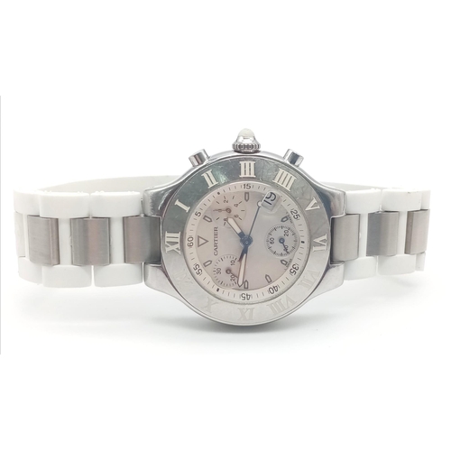 436 - A Cartier Chronoscaph Quartz Watch. White rubber and steel bracelet. Case - 38mm. Cream dial with th... 