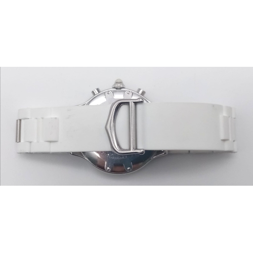 436 - A Cartier Chronoscaph Quartz Watch. White rubber and steel bracelet. Case - 38mm. Cream dial with th... 